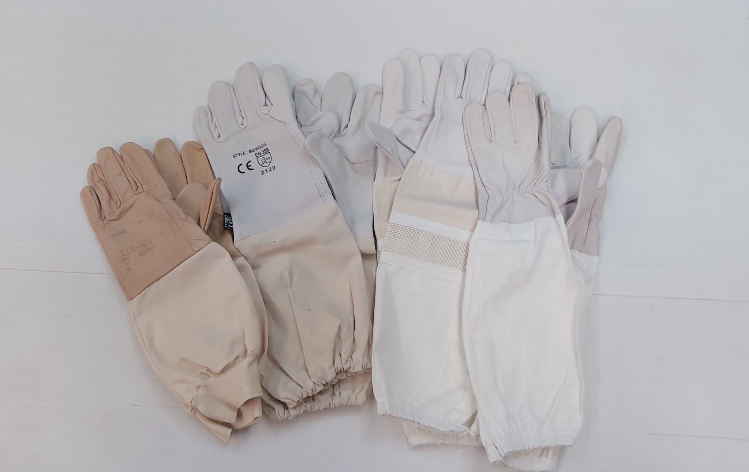 https://www.hiveworld.co.nz/wp-content/uploads/2021/08/Gloves-scaled-2.jpg